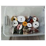 Tote 3/4 full of decorative wired ribbon