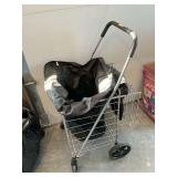 Folding shopping cart with bag liner.