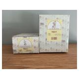Pair of Precious Moments figurines in original boxes