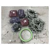 Assortment of raffia, wreaths, top hats