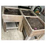 3 wooden raised beds