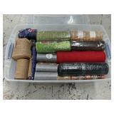 Assortment of rolls of mesh, burlap, etc. in tote