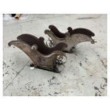 2 wood and metal sleighs