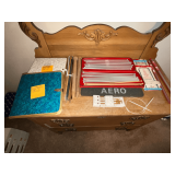 Large selection of knitting needles and crochet hooks.