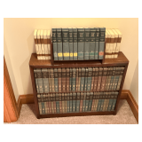 Wooden bookshelf 33' W x 8' D x 25' T with