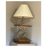 Table lamp with pair of quail in glass enclosed base