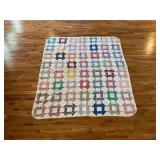 Churn dash patchwork quilt, hand stitched, 71' x 64'