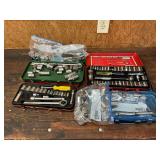 4 assorted socket sets in tin trays