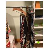 Men's ties, suspenders, tie rack.