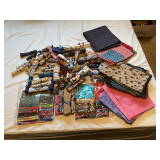 Assorted sizes of fabric remnants and 4' blocks.