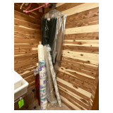 Rolls of fabric, table cloth vinyl, tweed, velvet, etc.