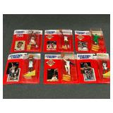 Starting Lineup basketball figures in unopened packages