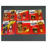 Starting Lineup basketball figures in unopened packages