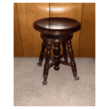 Swivel stool with ball and claw feet
