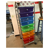 Rolling cart with craft supplies, 13' W x 16' D x 39' T