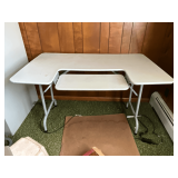 Folding sewing table, 48' L x 30' D x 29' T.