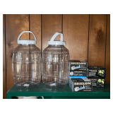 Pair of plastic 2-gallon? jugs