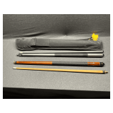 Halex graphite 19 oz. and Harvard wood pool sticks in case.