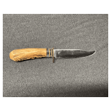 Handmade? knife with 5 1/2' blade, no markings, possible bone handle.