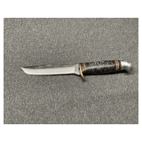 Western leather handle, 5' blade.