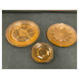 Yellow depression glass, plates and saucers.