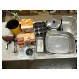 Frigidaire roasting pan, egg poacher, pineapple corer, muffin tins