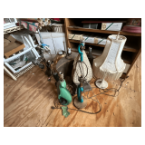 Assortment of lamps in various stages of disrepair/repair, shades