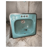 20" W x 18" D cast iron Kohler sink with metal trim.