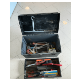 Tool box with an assortment of tools, rubber hammer, pliers