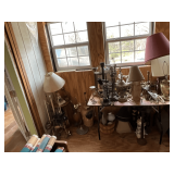 Assortment of lamps in various stages of disrepair/repair, shades