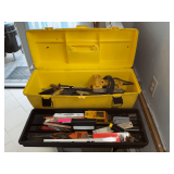 Tool box with an assortment of tools, hammer, electric stapler