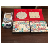 2 sets of dominoes and 4 wooden playing racks