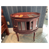 Oval curio cabinet with bevel glass, 31" W x  19 " D x 30" T