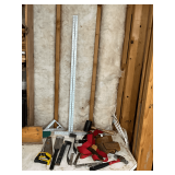 Assortment of small hand tools, tool belt, pry bar, hammers, mallet