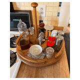 Wooden lazy susan, cup & saucer, salt & pepper shakers, pepper mills