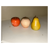 Three pieces of marble fruit