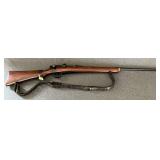 Military rifle that has been sportified, possibly 8mm, peep sights, 24 1/2" barrel, leather sling