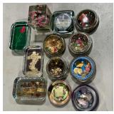 Assortment of flowers, plants and insects paperweights