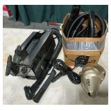 Shark and Oreck hand vacs with accessories.