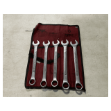Sunex metric wrenches in canvas pouch.