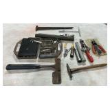 Shingle hatchet, needle nose pliers, etc.