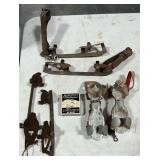 Vintage roller skates and ice skates, blade sharpener.