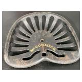McCormick cast iron implement seat