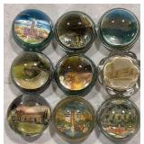 Group of 9 vintage souvenir glass paperweights