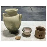 Urn and other pottery pieces