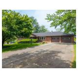 2,200+ sq. ft. Brick Ranch with Walkout Basement, Enclosed Sunporch & Additional Excavated Rear Garage on large lot in Sunrise Estates, Columbia, MO