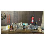 Bolt caddies with hardware, Kidde ABC fire extinguisher, cord reel, mallet, etc.