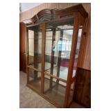 Glass front china cabinet, lighted, glass shelves, side entry, mirror back