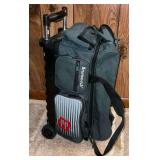 Brunswick rolling double bowling ball bag with Columbia 300 ball and towels