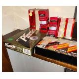 Assortment of golf balls, various brands.